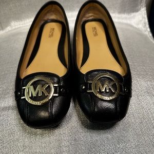Michael Kors Black Leather Moccasin size 9. Shoes Only worn a few times.
